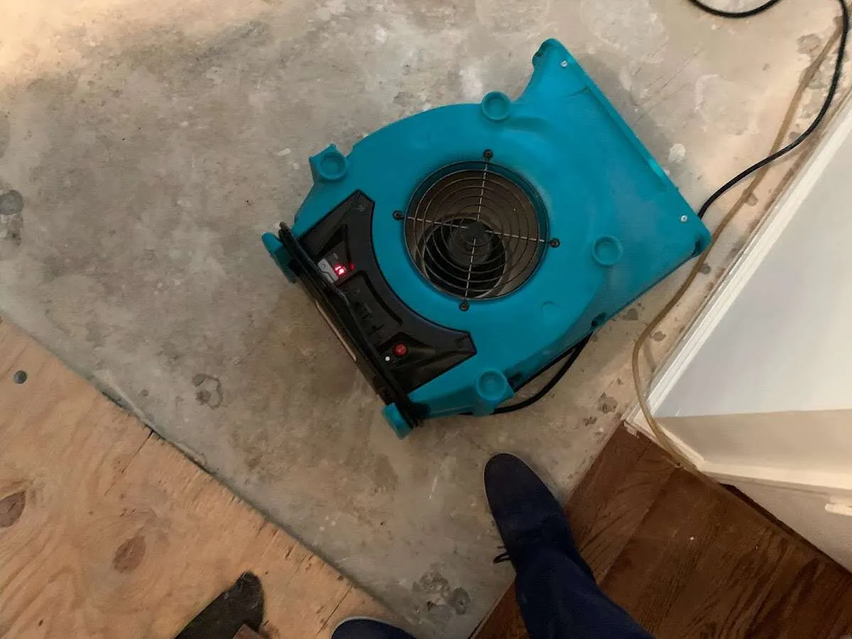 Air mover drying subfloor during Leak Detection & Repair in Santa Clara